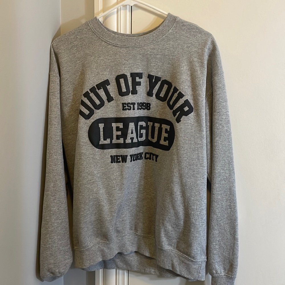 “Out Of Your League” Crew neck. Size - Medium. Color - black and grey.